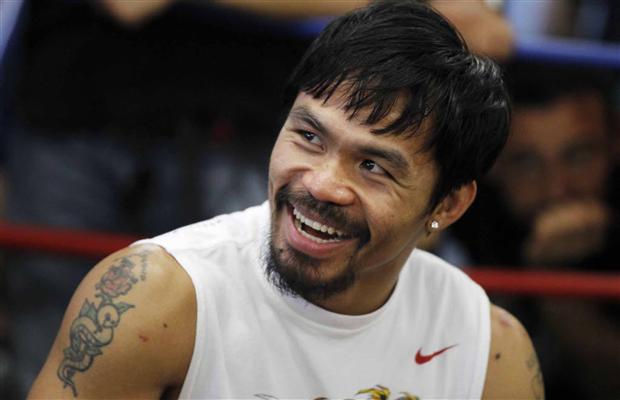 boxer-manny-pacquiao-smiles-during-a-media-workout-at-wild-card-boxing-club-in-los-angeles-calif-oct-26-2011